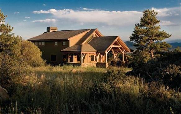 Nestled inside the Phantom Canyon Nature Preserve in Livermore, Colo., the LEED-Gold home offers unobstructed, panoramic views of the Rocky Mountains. No existing trees or boulders were disturbed during construction.
