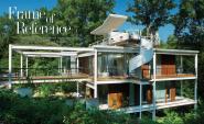 An existing steel structure serves as the armature for an enclosure of glass curtain walls and Cor-ten steel siding panels