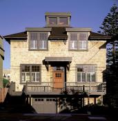 A thorough remodel restored the symmetry of the original 1884 street elevation, while adding some subtle contemporary touches.