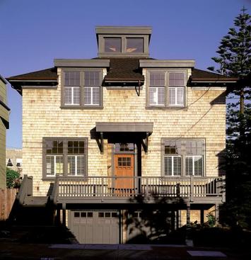 A thorough remodel restored the symmetry of the original 1884 street elevation, while adding some subtle contemporary touches. 