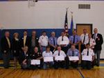 From left to right, Bob Mitchell (2000 NAHB president), Toni Rogan (Pennsylvania Builders Association president), Richard Critchfield (Somerset County Builders Association president) and representatives from the eight volunteer fire departments: Berlin, Central City, Friedens, Hooversville, Listie, Shanksville, Somerset, and Stoystown.