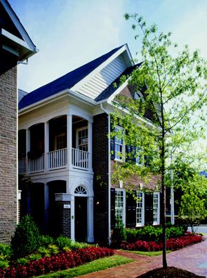 SIDE-YARD STORY: Featuring private entrance porches and courtyards akin to Charleston, S.C.–style homes, The Courtyard Homes at Old Town Village (above and right) in Alexandria, Va., a grand award winner in 1998, brought an extensive natural light source to the interior spaces of attached townhomes, giving them the appearance of detached houses and generating a profit that exceeded projections by 20 percent.