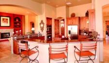 DISTINCTIVE DESIGN: Arched doorways and wall niches throughout the house are among the design details that keep A.F. Sterling's customer satisfaction high.