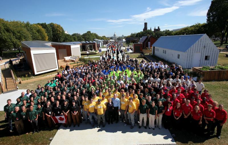 The 20 Solar Decathlon teams gather before the event's ribbon-cutting ceremony Oct. 8.