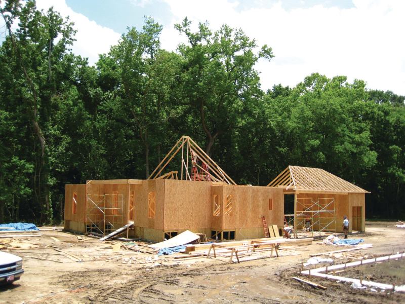 Going Up, Going Green: Builder Roy Domangue's trio of homes will be left partially finished to showcase various green building methods and materials to educate his peers, consumers, lenders, and regulatory agencies.