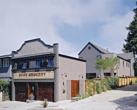 Rose Red Built on the site of a former grocery store, the Rose Street project incorporates the old buildings fa§ade in the front-loaded garage. Each unit features a private courtyard, 10-foot ceilings, and abundant natural light.