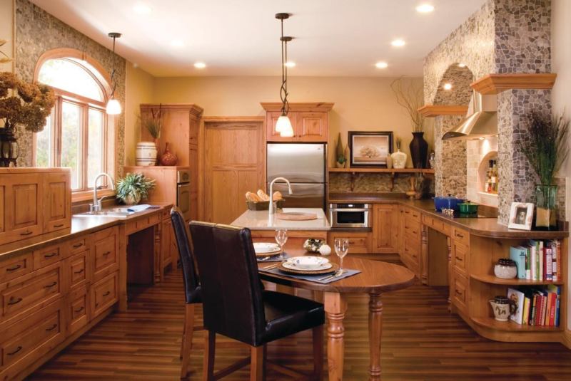 Less up Top: In this kitchen, Michalowski used open shelves instead of upper cabinets to create an open feel and to lower costs, as well as allowing more space for lighting.