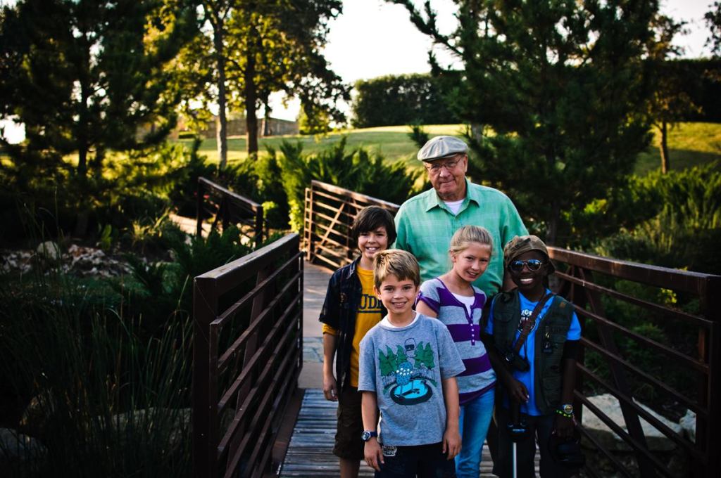 A TOUR OF THE NEIGHBORHOOD: Cast members from "Cooper & the Castle Hills Gang," a 51-miinute movie that developer Bright Realty financed to showcase its Castle Hills community outside of Dallas.