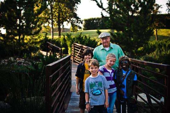 A TOUR OF THE NEIGHBORHOOD: Cast members from "Cooper & the Castle Hills Gang," a 51-miinute movie that developer Bright Realty financed to showcase its Castle Hills community outside of Dallas.
