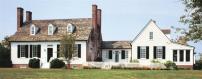 The addition doubled the size of a historic manor house while leaving its character intact.