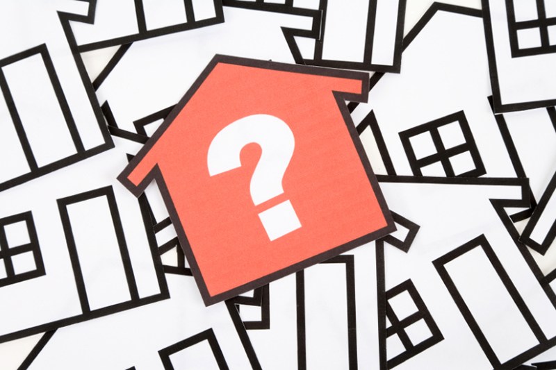a red home sign,  Real Estate Concept