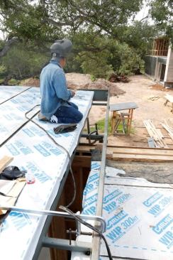 Steel fascia and internal gutter system.