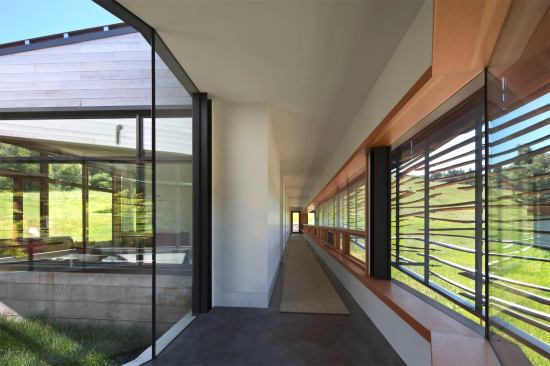 A bend in the floor plan marks the boundary between public and private zones.