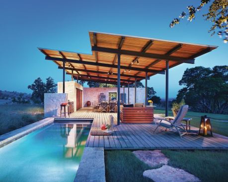 In west Texas Hill Country, the climate allows for outdoor living much of the year. This covered space, by Lake Flato Architects and Duecker Construction, functions as a family gathering space throughout the seasons.
