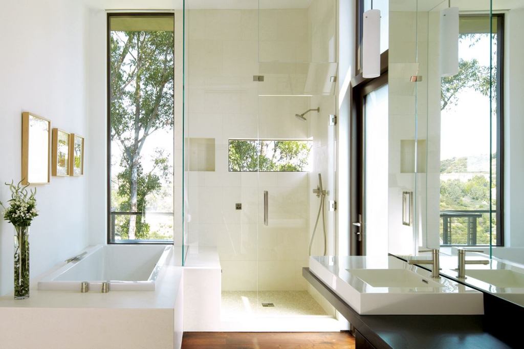 Kitchens continue to be a hub and homeowners want open areas with strong ties to adjoining rooms, but smart compact layouts are replacing copious square footage.