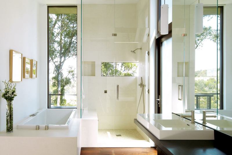 Kitchens continue to be a hub and homeowners want open areas with strong ties to adjoining rooms, but smart compact layouts are replacing copious square footage.