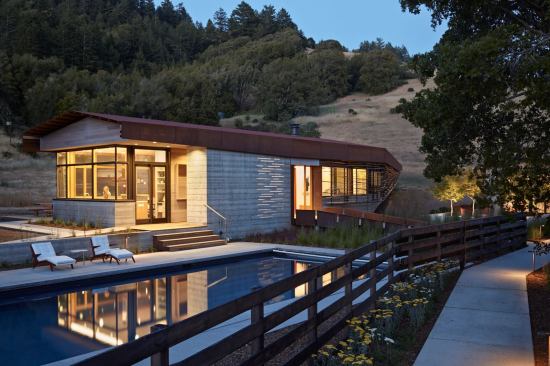 The house’s massing acts as an extension of forms in the landscape.