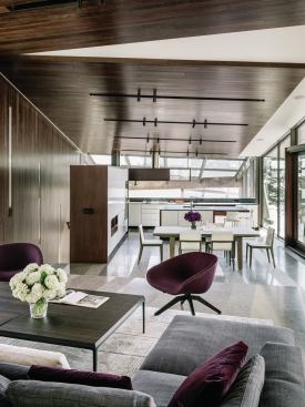 An open-plan great room occupies the building’s uppermost level.