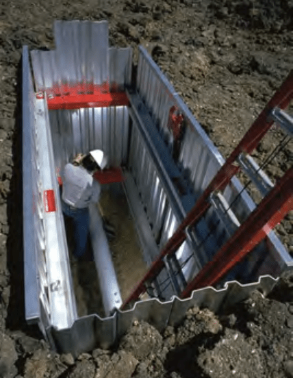 Trenches must have proper shoring and supports as shown here, says OSHA.
