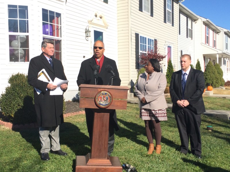 The celebration of the first home purchase under the Smart Buy program. From left: Maryland Department of Housing and Community Development Secretary Kenneth Holt, Lt. Governor Boyd Rutherford, new homeowners Ms. Jasmine Townsel and Brian Hawkins.