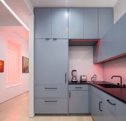 House parties are a regular event here and inspired many of our design decisions. The front door opens directly into the kitchen - the center of party action. I designed the cabinetry as a geometric composition that plays off the art and the feel of a gallery home.