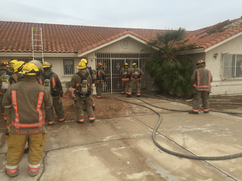 The Clark County Fire Department's live fire training exercise in progress at one of the abandoned homes provided by American West Development.