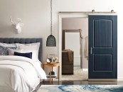 The patent-pending DesignGlide Barn Door system by Jeld-Wen can be used to convert a new or salvaged door into a sliding barn door in just a few steps.