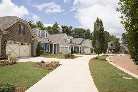 An avenue of model homes at Cresswind Charlotte by KOLTER HOMES.