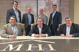 Comprising the executive team of McGuyer Homebuilders, Inc., (MHI) are (bottom row, from left) Gary Tesch, President; Frank McGuyer, Chairman and Chief Executive Officer; David Bruning, Chief Financial Officer (top row, from left) William ‘Mac’ McKinnie, General Counsel; Paul Blackburn, Houston Region President; Denny Garrett, Central Region President; and Keith Faseler, Division President Land Development.