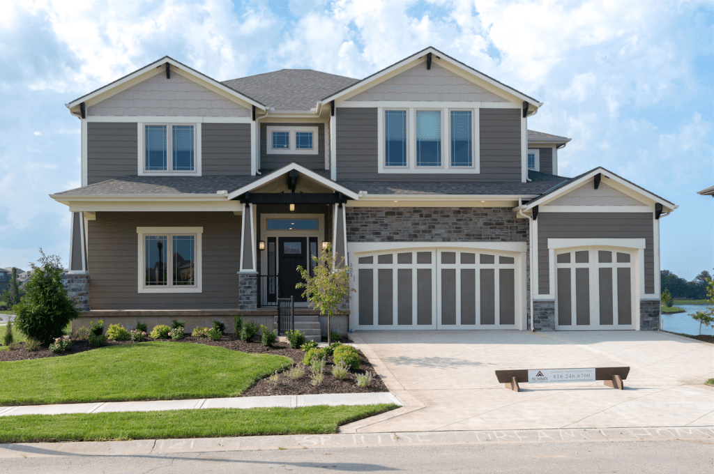 Summit Homes offers designs with three car garages in Kansas City, Mo.