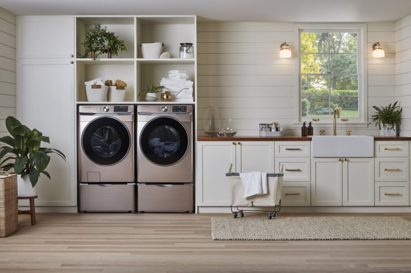 The Samsung WF6300 front-load washer and matching DV6300 dryer, shown here in Champagne Stainless Steel.