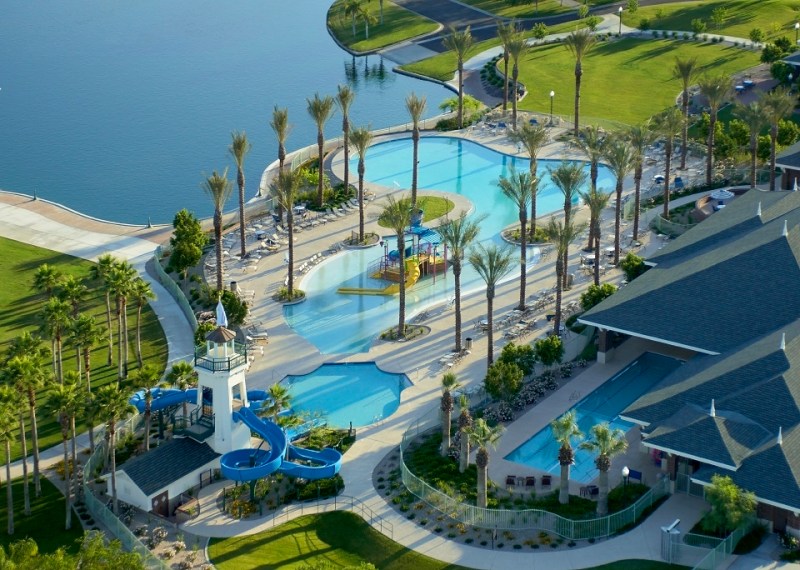 The Estrella master plan in Goodyear, Arizona, features a wealth of outdoor amenities, including resort-style pools, a waterpark, and 72 acres of lakes.