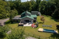 Anthony Carrino’s Catskills vacation home includes luxury gas amenities such as a heated pool, a standby generator, an outdoor grill, and a 48-inch gas cooktop in the kitchen.