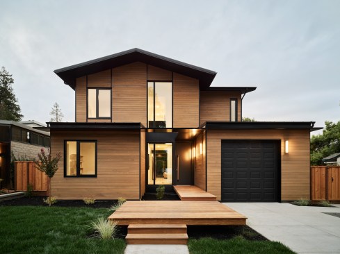 A steel entry canopy provides an understated yet design-forward signature.