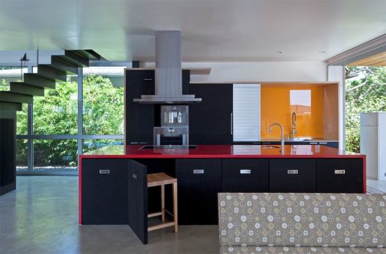 In a fresh take on built-in kitchen seating, these rubber-backed chairs tuck under the island when not in use. Project: Superb-A House, Venice, Calif.; Architect/Contractor: mnm|MOD, Santa Monica, Calif.
