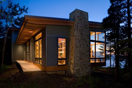 Eagle Harbor, a project that took Finne to Michigan’s Upper Peninsula, is so close to the shore of Lake Superior that storm-driven spray sometimes splashes the house.