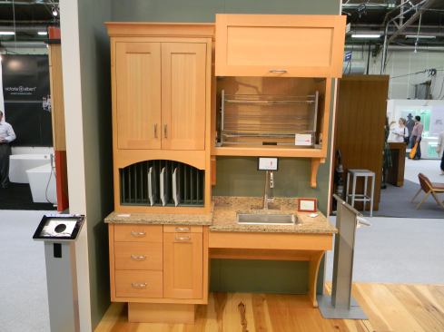 The company now offers its Universal Access cabinet package as part of any kitchen design. Highlights include touch-open hardware, cabinets at different heights, and angle sink cabinets to accommodate a wheelchair. Shown here in fir, the line can be ordered in any style and almost any specie the company offers. 
www.crown-point.com.