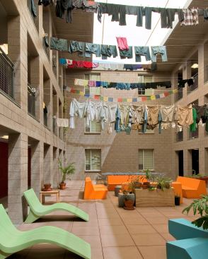 The Gold Standard Laundry hangs drying in the “sustainabiliity room”&nbsp;inside student housing at Barrett Honors College at Arizona State University. This building earned LEED Gold certification.