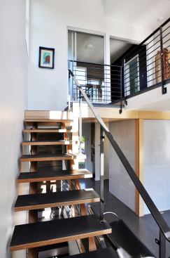 The ommitance of risers allows light to flow throughout the 1,330-square foot primary residence.