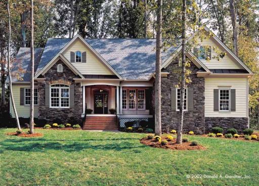 3. Stunning Exterior: Despite its modest size (less than 2,100 square feet) and cottage detailing, this plan lives big. From the foyer, columns announce the great room, highlighted by a cathedral ceiling, screened-porch access, and a fireplace with surrounding built-ins. Cathedral ceilings also grace the kitchen and breakfast area, as well as the front bedroom/study. For more images and information, click 
here.