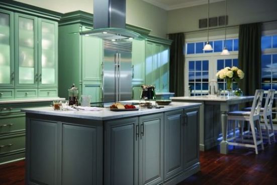 Elkay The firm says its Design-Craft series has more space than traditional framed cabinets, offering deeper wall cabinets, up to 60 percent more drawer space, and hundreds of organizational options. The Barcelona & Valencia lines (shown) feature clean lines that blend well with transitional design, as well as classic details such as the stacked crown molding and turned leg on the island. 
www.elkayusa.com