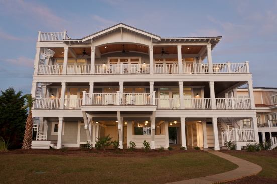 With its rear elevation facing North Carolina’s Atlantic coast, views were of the essence in this beach home, which welcomes sun and scenery through windows and glass doors rated to withstand hurricane-force winds. Project: 40th Street Project; Location: Sunset Beach, N.C.; Builder: Blue Sky Building Co.