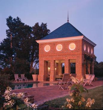 Varying brick patterns, with and without mortar, add interest to the monochromatic material palette. Landscape architect Jay Graham explains that historic patterns indigenous to the Mid-Atlantic region were alternated according to which areas are "stopping places and moving places."