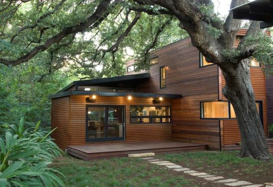 A collaboration between architects Christopher T. Cobb and Camille Urban Jobe, Eva Street is a 2,145-square-foot SIPs house with Corten steel cladding. The home&nbsp;is outfitted with&nbsp;tankless water heaters, dual-flush toilets, and bamboo floors, among other green features.