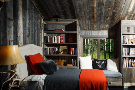 The entire bedroom and bathroom addition is finished in recycled snow fencing.