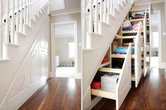 Extra storage in the form of pull-out drawers can be hidden under the stairs.