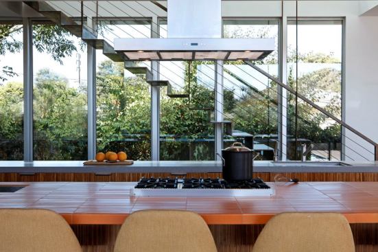 This kitchen, with its parallel islands, won Kitchen of the Year for how it pours its heart out—to the outdoors, that is.&nbsp;Situated along a wall of sliding glass, the sturdy outer island offers a gathering spot near the pool for guests, and an accessible snacking spot for the family’s four kids. Project: Appleton Living, Venice, Calif.; Builder: Core Construction and Development, Los Angeles; Architect: MINARC, Santa Monica, Calif.