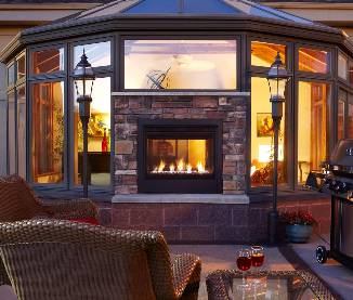 Heat & GloHeat & Glo’s two-sided gas fireplace gives
outdoor living spaces a contemporary look while offering two unique views of
the home and fireside. Twilight Modern splits the home’s exterior wall and can
be installed flush with the interior or exterior facing. Rated as a fireplace
and exterior window to facilitate installation, the unit employs 38,000 BTUs
powering flames that rise through colored class media—black, amber, and
crystal—while reflecting off of a black porcelain firebox.&nbsp;www.heatnglo.com.