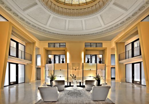 Grand and Residential Project of the Year, Renovated, Restored or Adaptive Re-Use Residential Project. Builder: Belfor Construction, First Church LLC. Architect: Runberg Architecture Group. The church's original stained glass dome, preserved in this modern, multifamily Seattle building, allows natural light to stream into the townhouses.