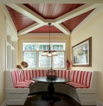 Built-in dining booths bring extra seating space to the kitchen.
